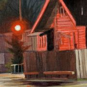 House and traffic light at night